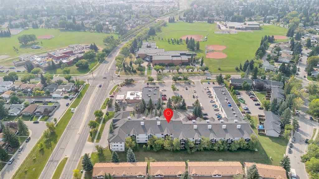 MLS® A2255765 - Unit #106 2022 Canyon Meadows Drive SE in Queensland Calgary, Residential