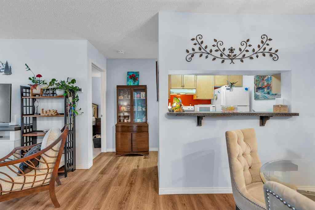 MLS® A2255765 - Unit #106 2022 Canyon Meadows Drive SE in Queensland Calgary, Residential