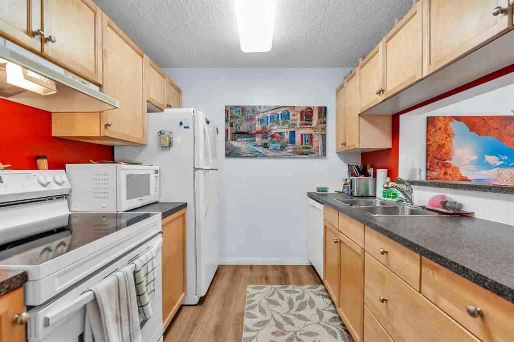 MLS® A2255765 - Unit #106 2022 Canyon Meadows Drive SE in Queensland Calgary, Residential