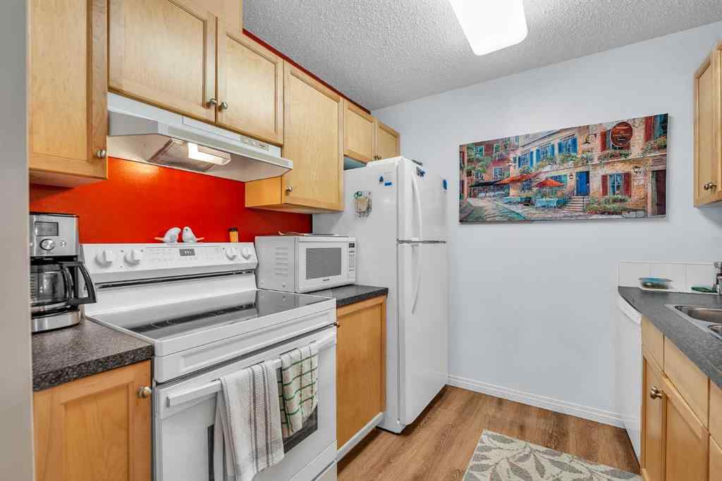 MLS® A2255765 - Unit #106 2022 Canyon Meadows Drive SE in Queensland Calgary, Residential