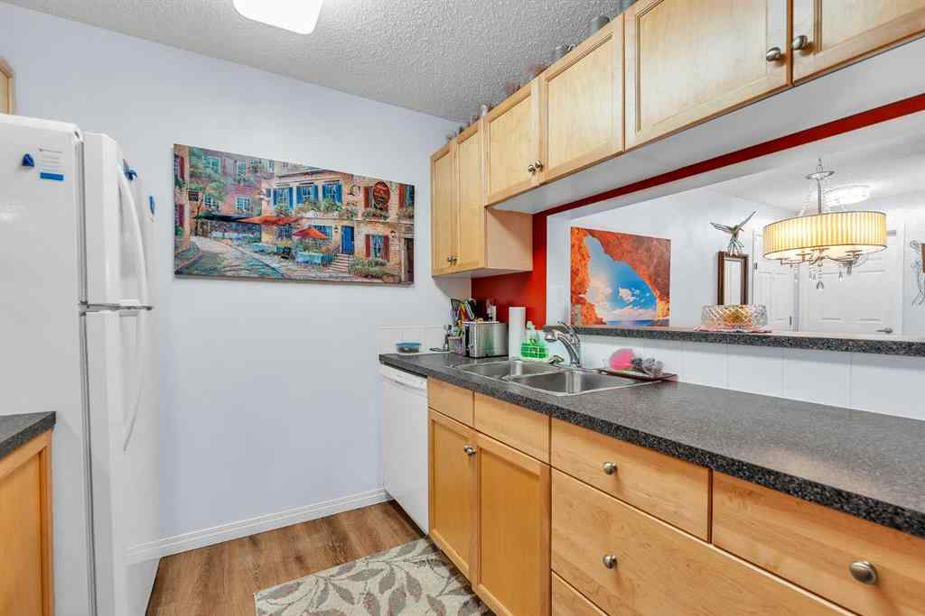 MLS® A2255765 - Unit #106 2022 Canyon Meadows Drive SE in Queensland Calgary, Residential