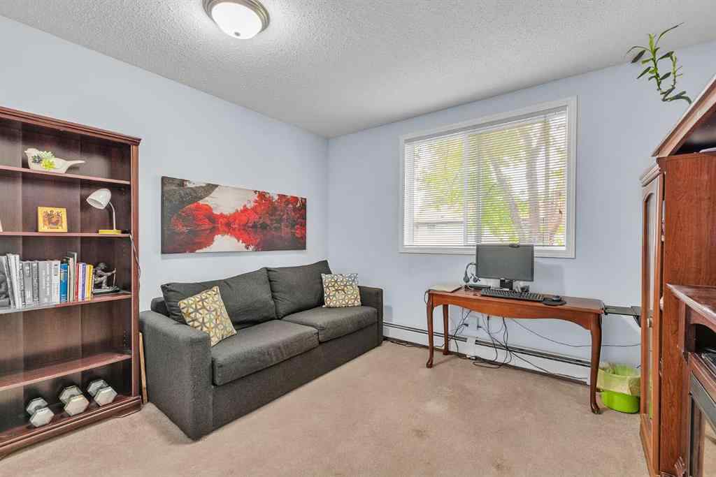 MLS® A2255765 - Unit #106 2022 Canyon Meadows Drive SE in Queensland Calgary, Residential