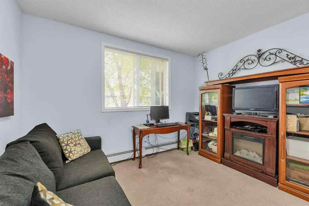 MLS® A2255765 - Unit #106 2022 Canyon Meadows Drive SE in Queensland Calgary, Residential