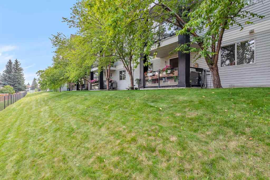 MLS® A2255765 - Unit #106 2022 Canyon Meadows Drive SE in Queensland Calgary, Residential