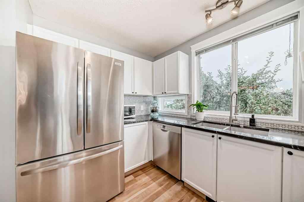 MLS® A2255789 - 71 Tuscany Springs Rise NW in Tuscany Calgary, Residential