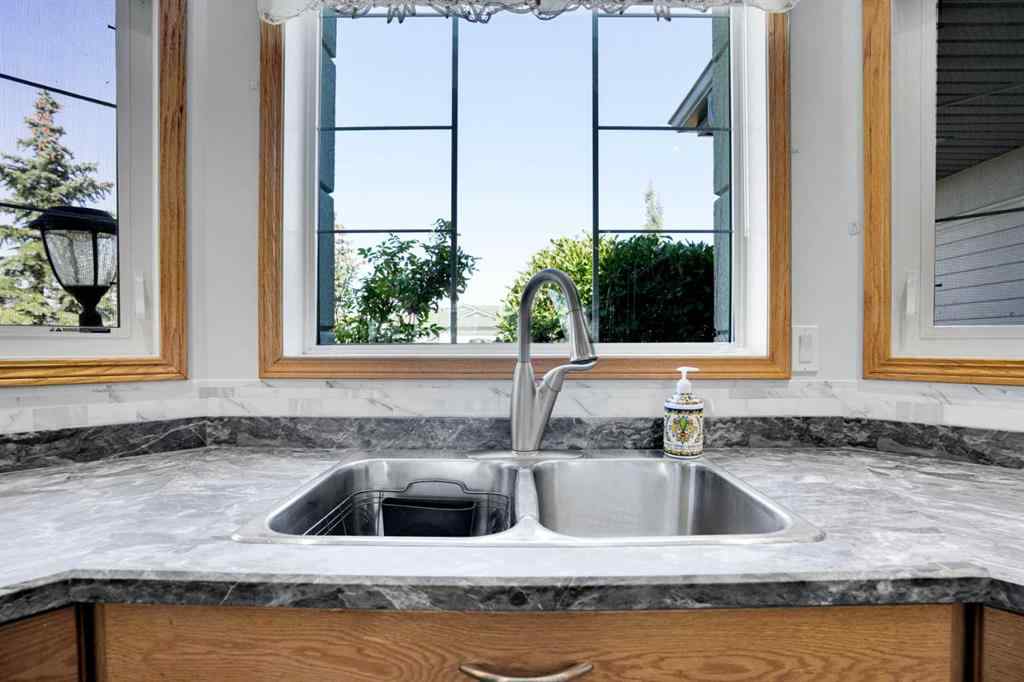MLS® A2255791 - 633 Advent Bay  in Prince Of Peace Village Rural Rocky View County, Residential