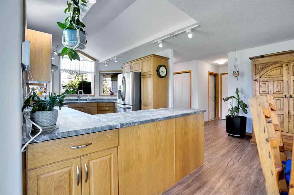 MLS® A2255791 - 633 Advent Bay  in Prince Of Peace Village Rural Rocky View County, Residential