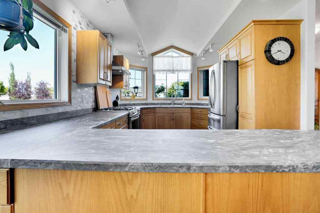 MLS® A2255791 - 633 Advent Bay  in Prince Of Peace Village Rural Rocky View County, Residential