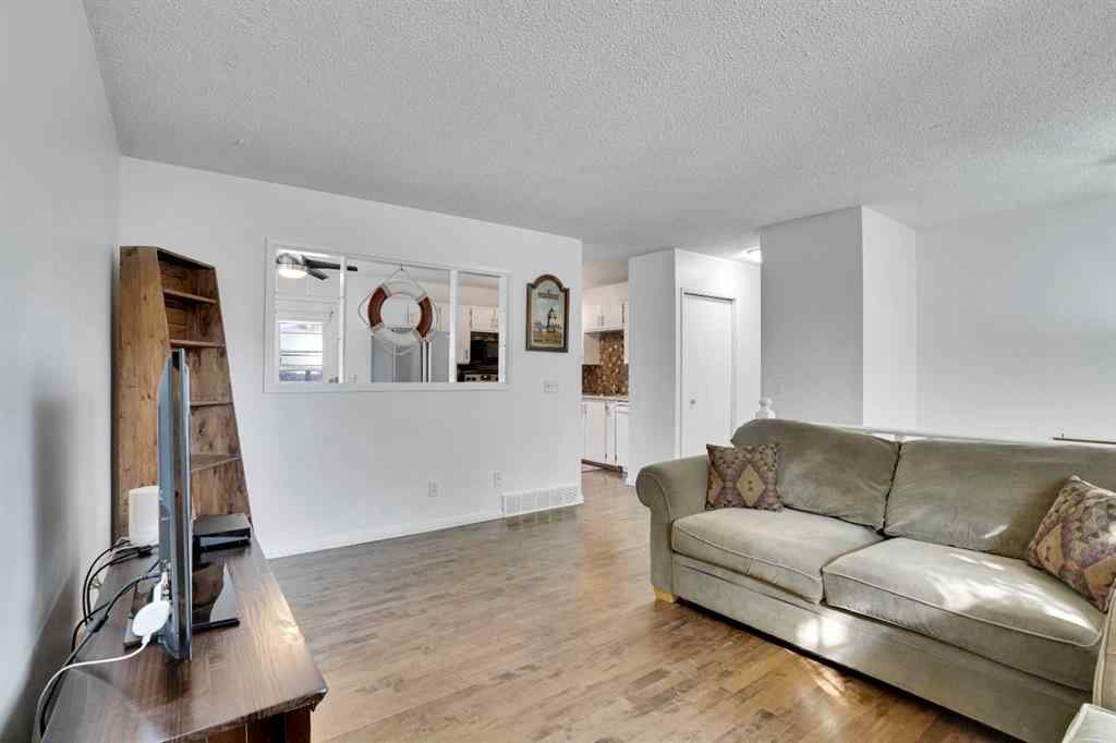 MLS® A2255793 - 97 Alpine Crescent SE in Airdrie Meadows Airdrie, Residential