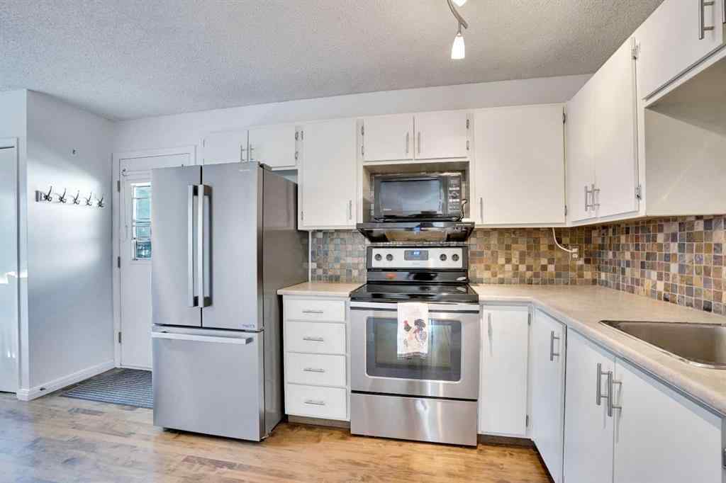 MLS® A2255793 - 97 Alpine Crescent SE in Airdrie Meadows Airdrie, Residential