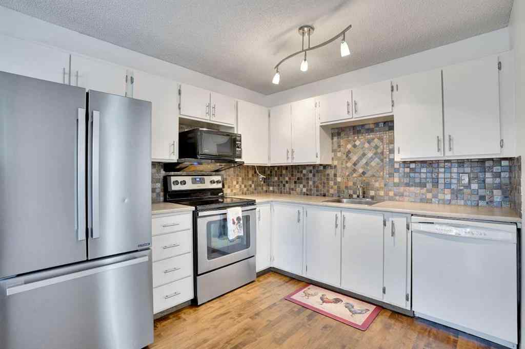 MLS® A2255793 - 97 Alpine Crescent SE in Airdrie Meadows Airdrie, Residential
