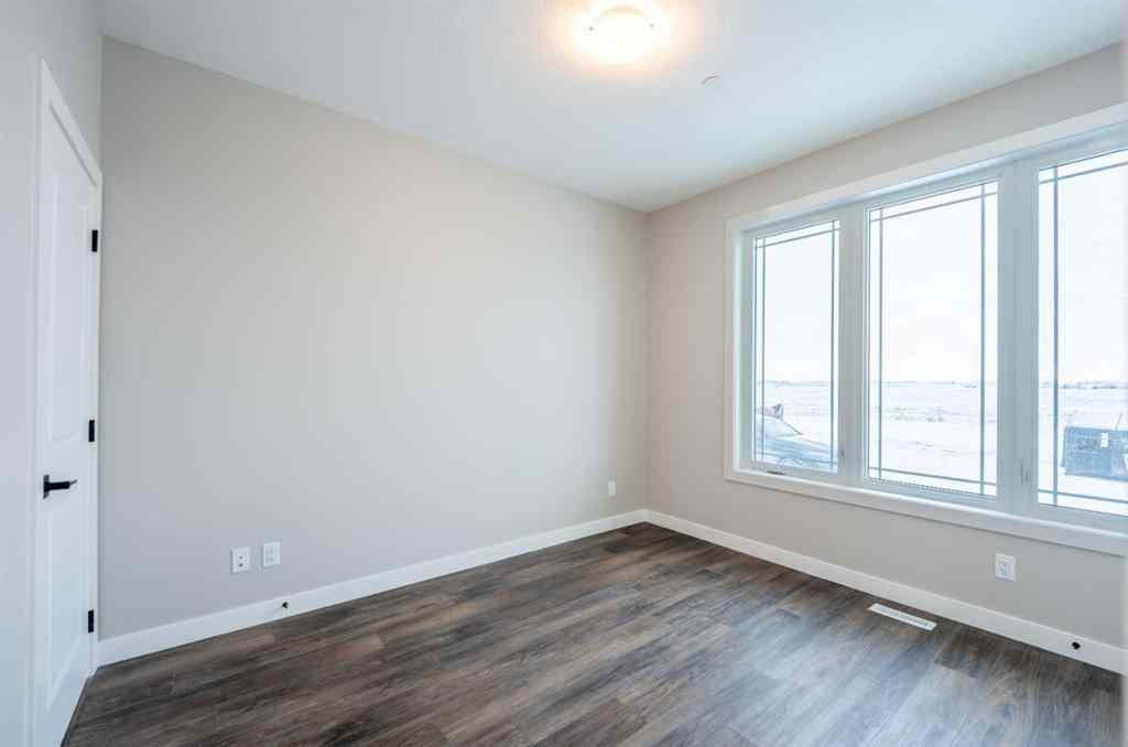 MLS® A2255795 - 419 Hotchkiss Manor SE in Hotchkiss Calgary, Residential