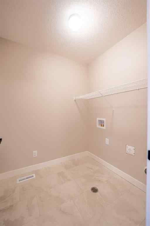 MLS® A2255795 - 419 Hotchkiss Manor SE in Hotchkiss Calgary, Residential