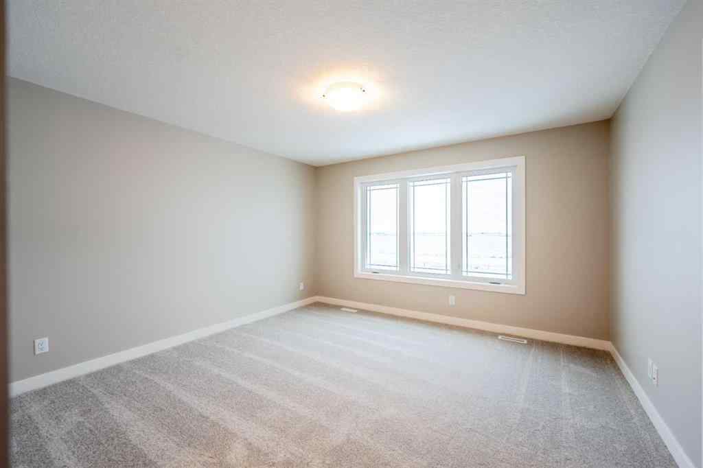 MLS® A2255795 - 419 Hotchkiss Manor SE in Hotchkiss Calgary, Residential