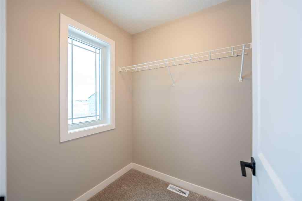 MLS® A2255795 - 419 Hotchkiss Manor SE in Hotchkiss Calgary, Residential