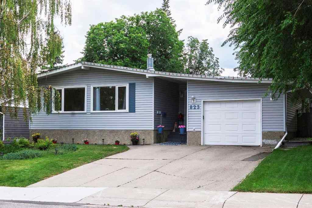 MLS® A2255815 - 823 Cannell Road SW in Canyon Meadows Calgary, Residential