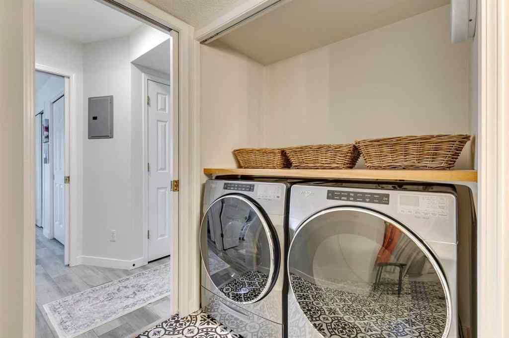 MLS® A2255824 - 1305 Sienna Park Green SW in Signal Hill Calgary, Residential