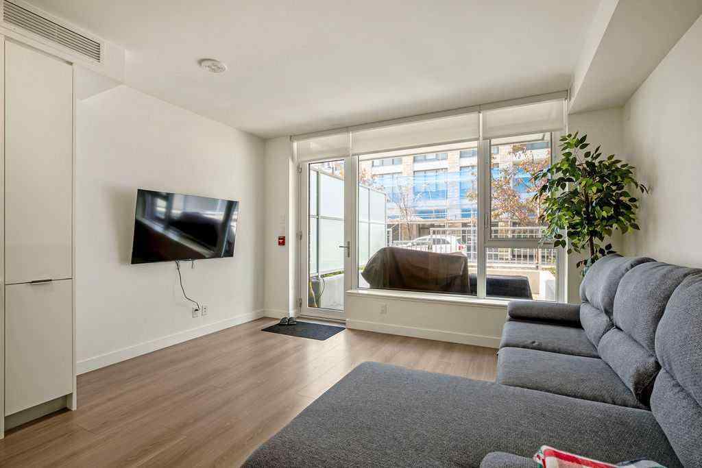 MLS® A2255840 - Unit #103 108 Waterfront Court SW in Chinatown Calgary, Residential
