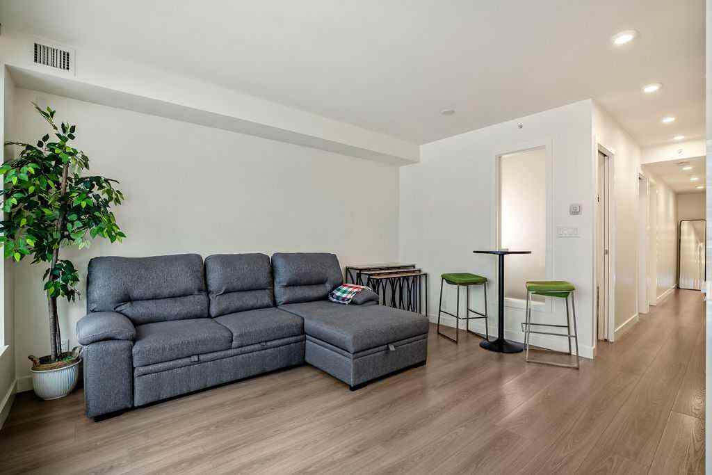 MLS® A2255840 - Unit #103 108 Waterfront Court SW in Chinatown Calgary, Residential