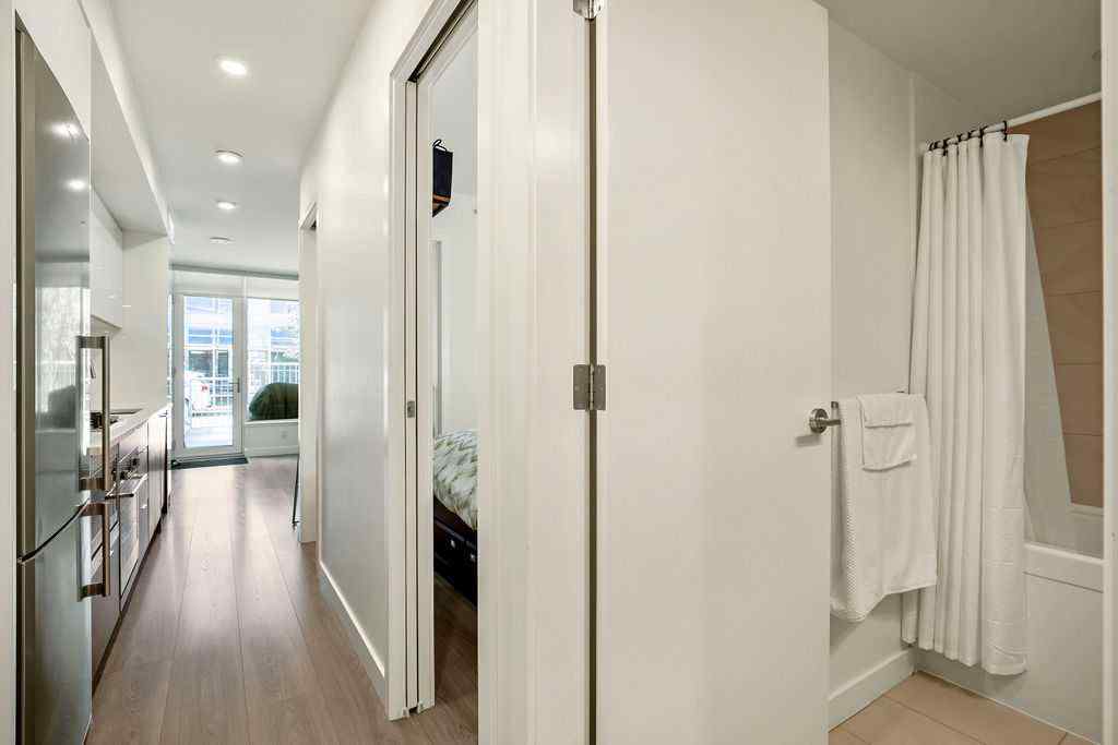 MLS® A2255840 - Unit #103 108 Waterfront Court SW in Chinatown Calgary, Residential