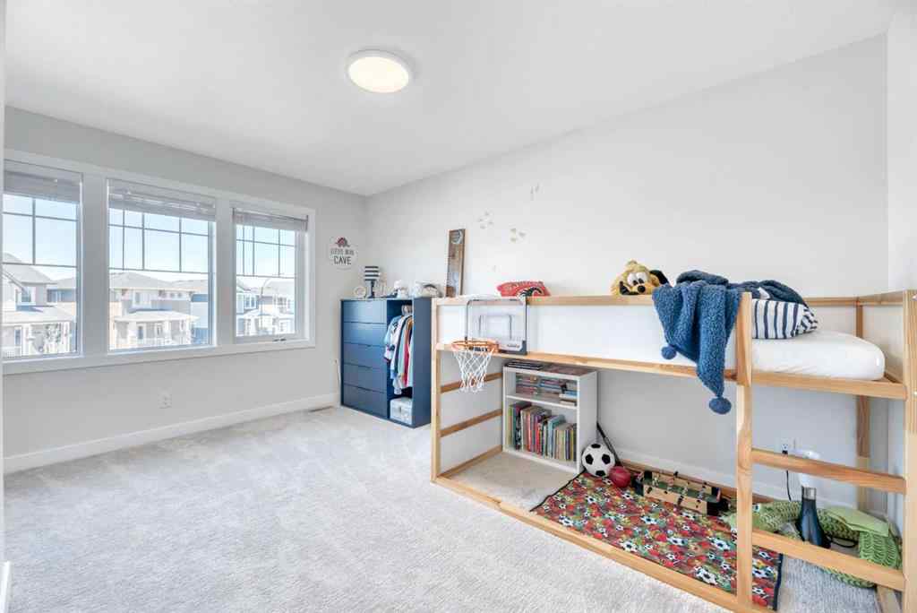 MLS® A2255855 - 656 Reynolds Crescent SW in Coopers Crossing Airdrie, Residential
