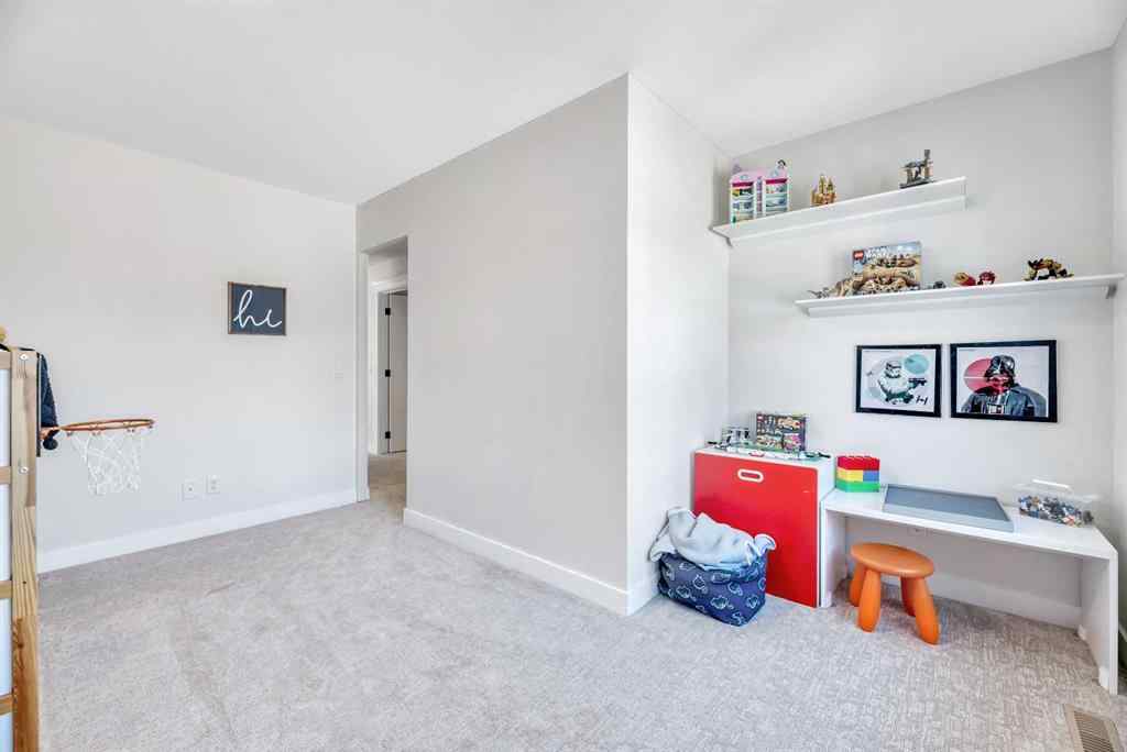 MLS® A2255855 - 656 Reynolds Crescent SW in Coopers Crossing Airdrie, Residential