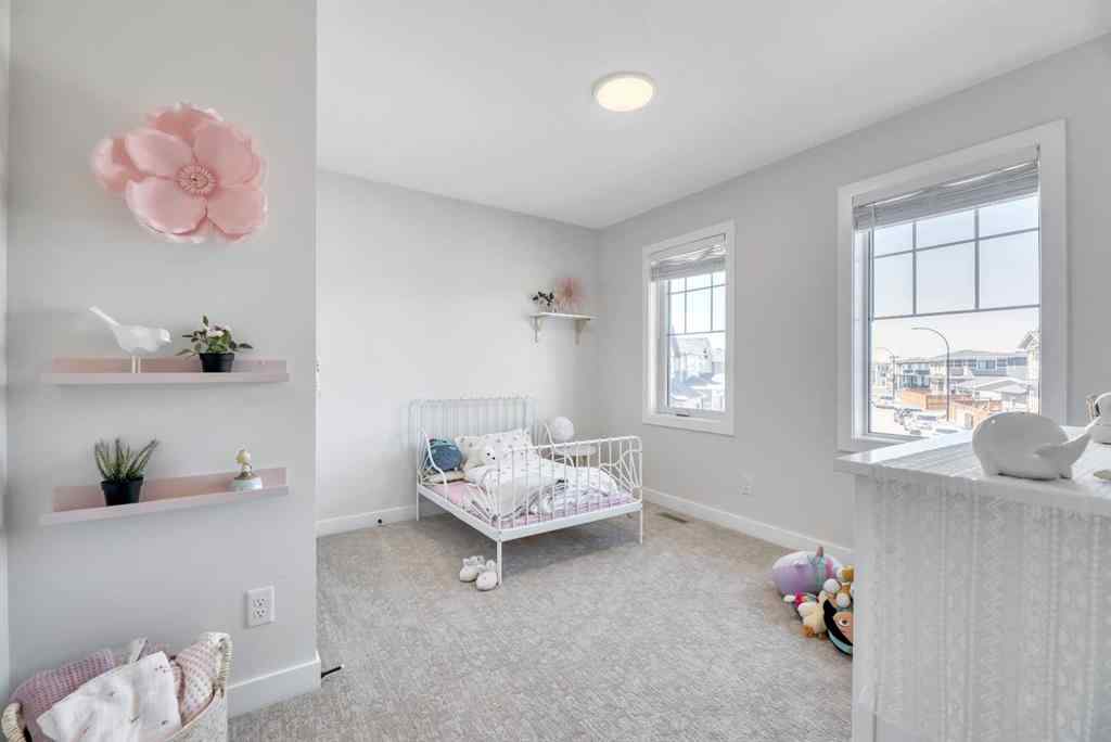 MLS® A2255855 - 656 Reynolds Crescent SW in Coopers Crossing Airdrie, Residential