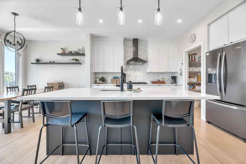 MLS® A2255855 - 656 Reynolds Crescent SW in Coopers Crossing Airdrie, Residential