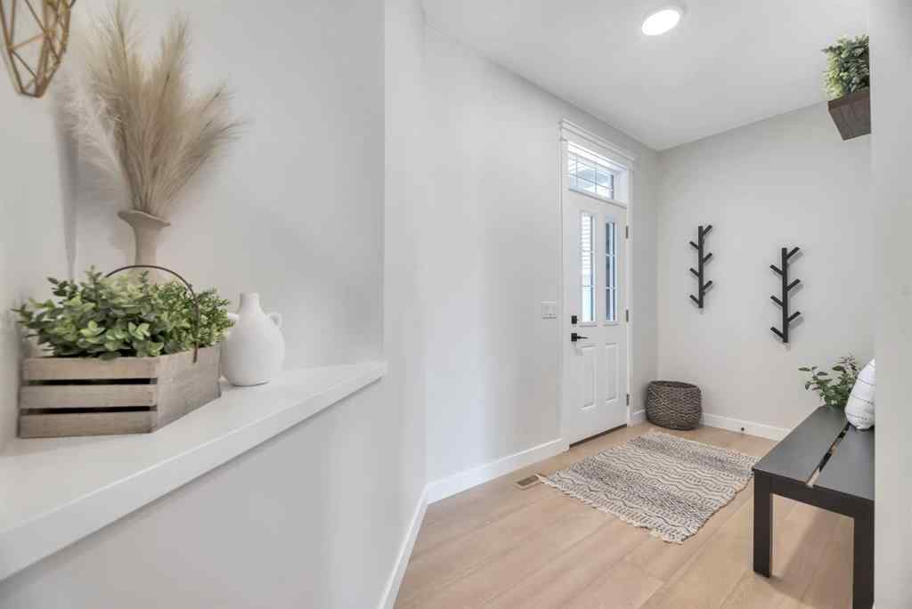 MLS® A2255855 - 656 Reynolds Crescent SW in Coopers Crossing Airdrie, Residential