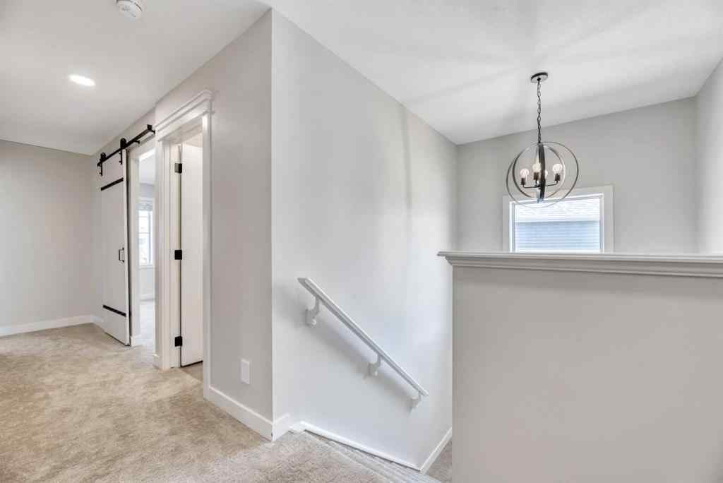 MLS® A2255855 - 656 Reynolds Crescent SW in Coopers Crossing Airdrie, Residential