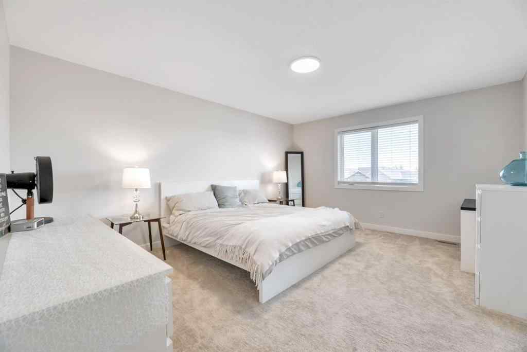 MLS® A2255855 - 656 Reynolds Crescent SW in Coopers Crossing Airdrie, Residential