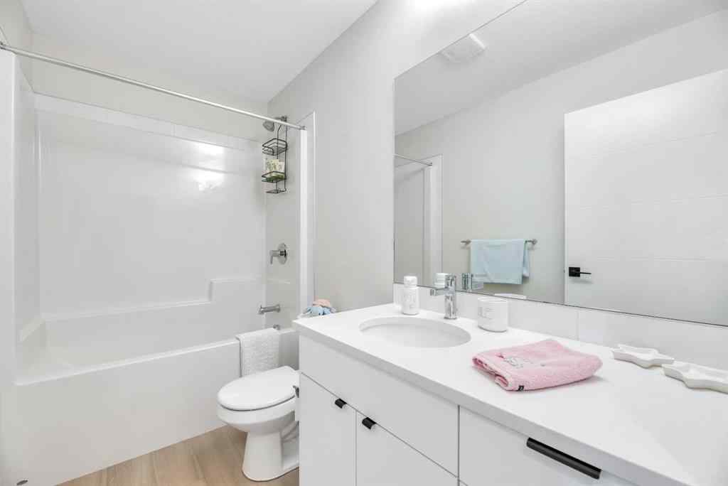 MLS® A2255855 - 656 Reynolds Crescent SW in Coopers Crossing Airdrie, Residential