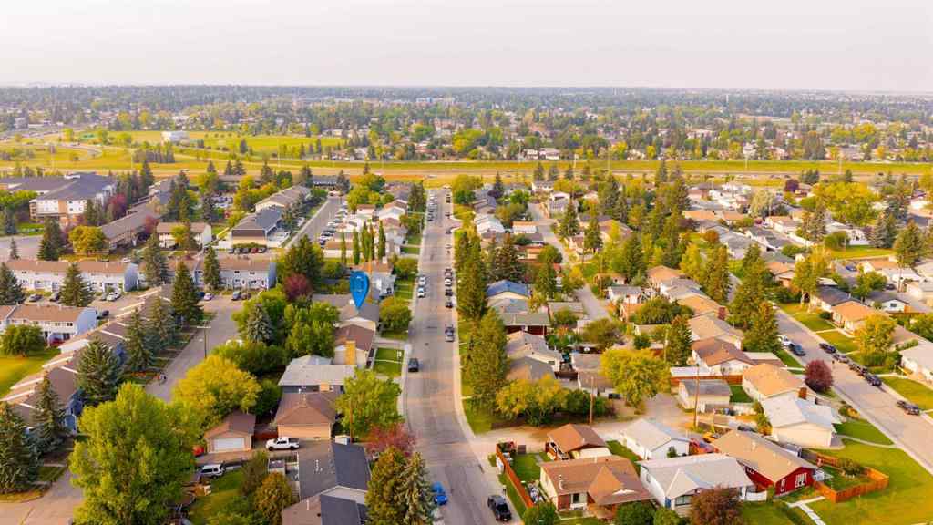 MLS® A2255861 - 143 Manora Drive NE in Marlborough Park Calgary, Residential
