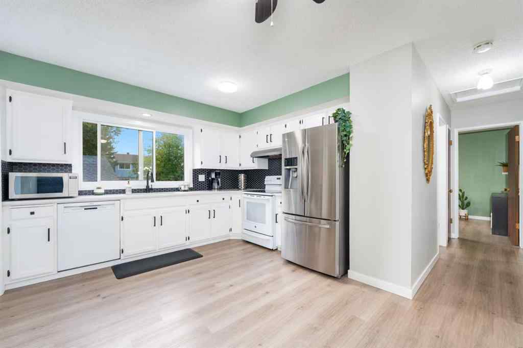 MLS® A2255861 - 143 Manora Drive NE in Marlborough Park Calgary, Residential