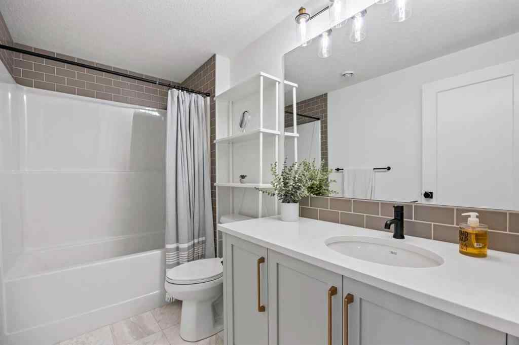 MLS® A2255875 - 656 Bayview Way SW in Bayview Airdrie, Residential