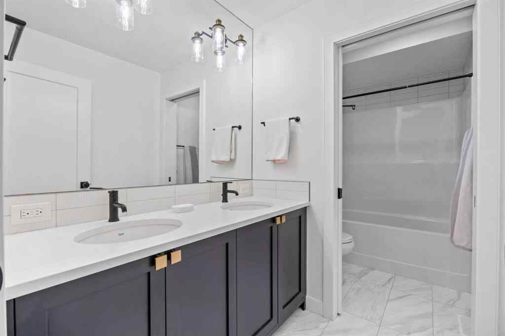 MLS® A2255875 - 656 Bayview Way SW in Bayview Airdrie, Residential
