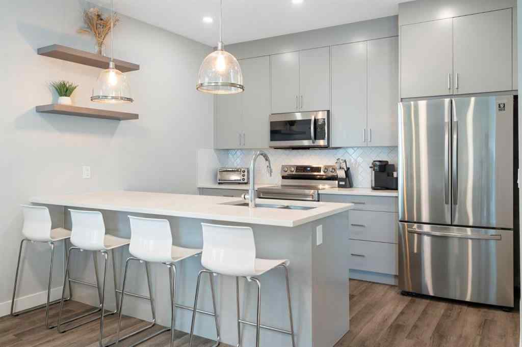 MLS® A2255878 - Unit #2 136 21 Avenue NE in Tuxedo Park Calgary, Residential
