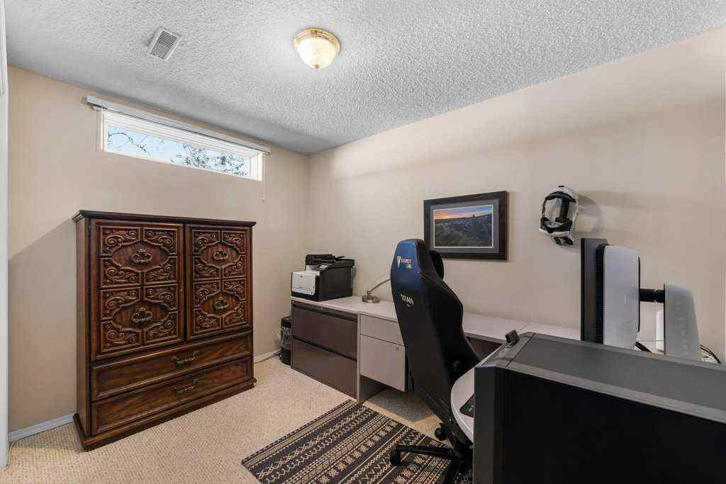 MLS® A2255899 - 83 Macewan Park Heights NW in MacEwan Glen Calgary, Residential