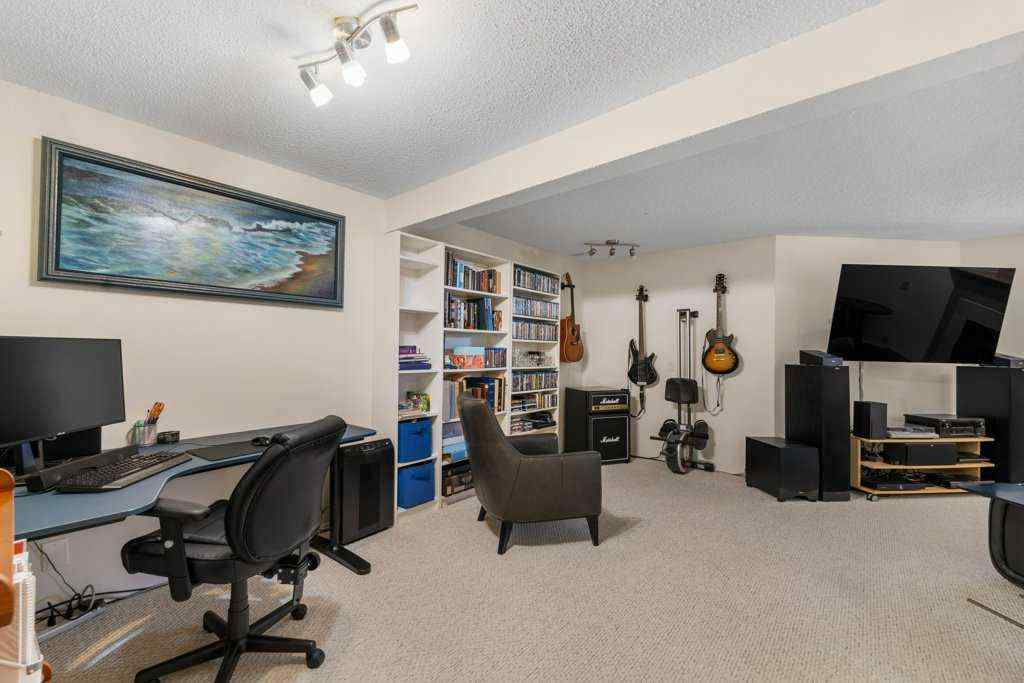 MLS® A2255899 - 83 Macewan Park Heights NW in MacEwan Glen Calgary, Residential