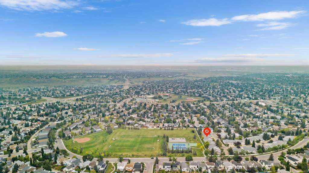 MLS® A2255899 - 83 Macewan Park Heights NW in MacEwan Glen Calgary, Residential