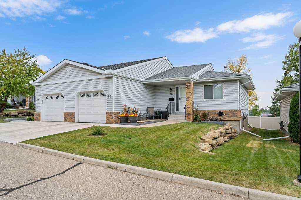 MLS® A2255899 - 83 Macewan Park Heights NW in MacEwan Glen Calgary, Residential