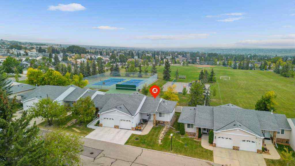 MLS® A2255899 - 83 Macewan Park Heights NW in MacEwan Glen Calgary, Residential