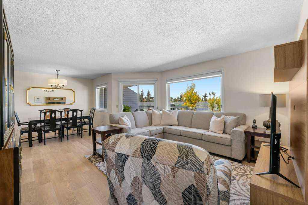 MLS® A2255899 - 83 Macewan Park Heights NW in MacEwan Glen Calgary, Residential