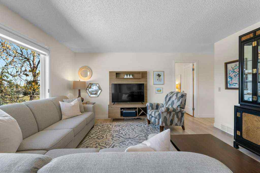 MLS® A2255899 - 83 Macewan Park Heights NW in MacEwan Glen Calgary, Residential