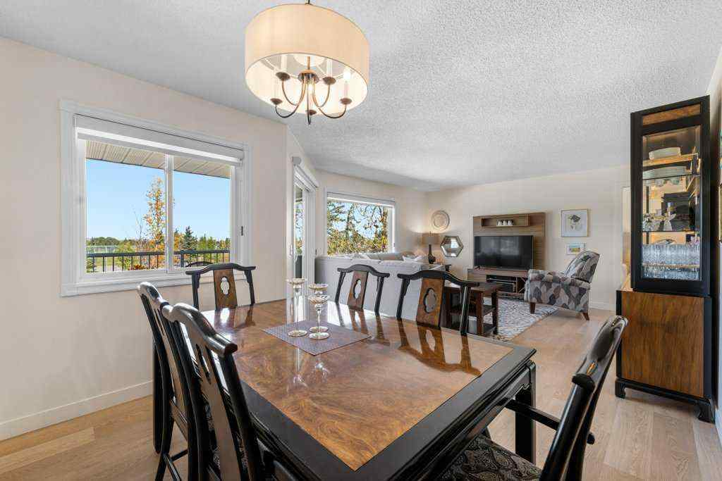 MLS® A2255899 - 83 Macewan Park Heights NW in MacEwan Glen Calgary, Residential