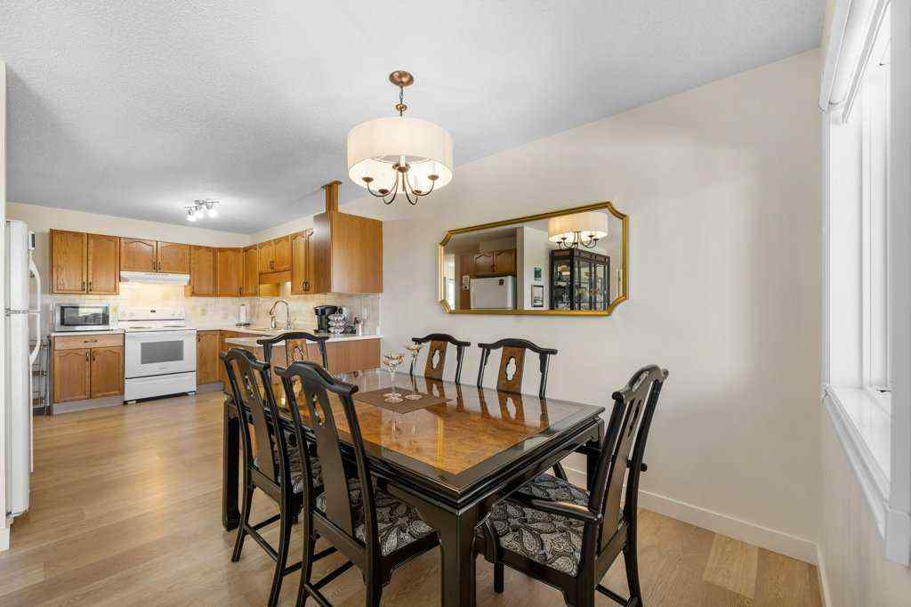 MLS® A2255899 - 83 Macewan Park Heights NW in MacEwan Glen Calgary, Residential