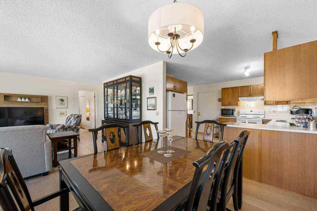 MLS® A2255899 - 83 Macewan Park Heights NW in MacEwan Glen Calgary, Residential