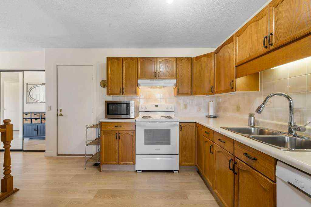 MLS® A2255899 - 83 Macewan Park Heights NW in MacEwan Glen Calgary, Residential