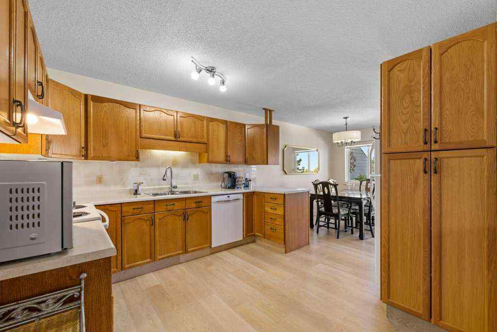 MLS® A2255899 - 83 Macewan Park Heights NW in MacEwan Glen Calgary, Residential