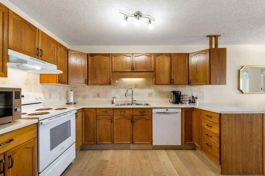 MLS® A2255899 - 83 Macewan Park Heights NW in MacEwan Glen Calgary, Residential